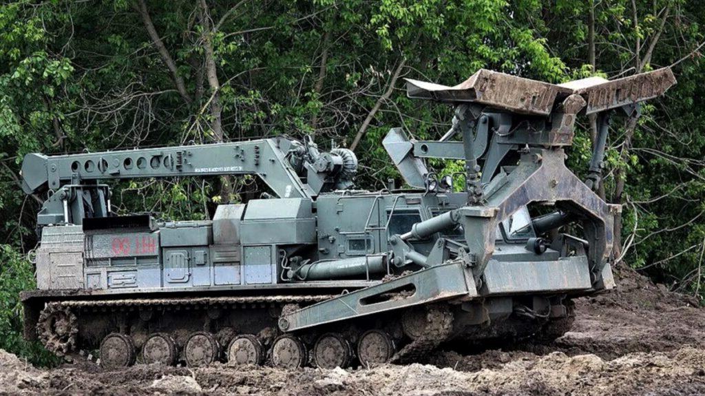 photo of a BAT-2 AEV used by the Ukrainian and Russian armies. The BAT-2 has a 13-foot wide bulldozer blade, and a 22-foot, two-ton crane for clearing obstacles.